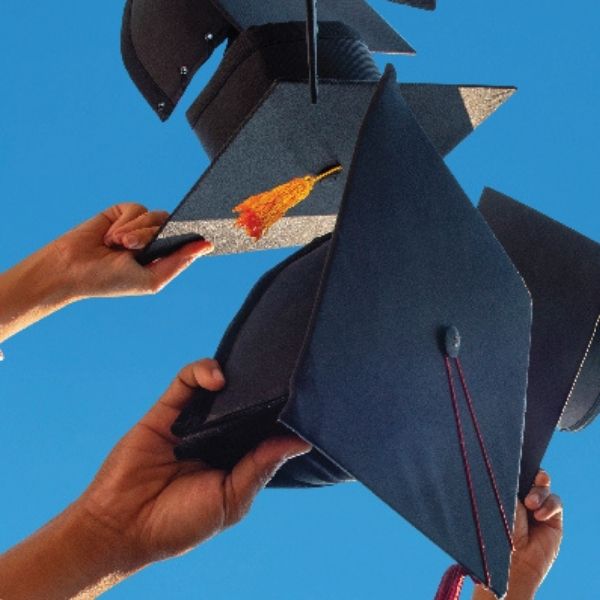 June Blog feature image of group of black graduation hats